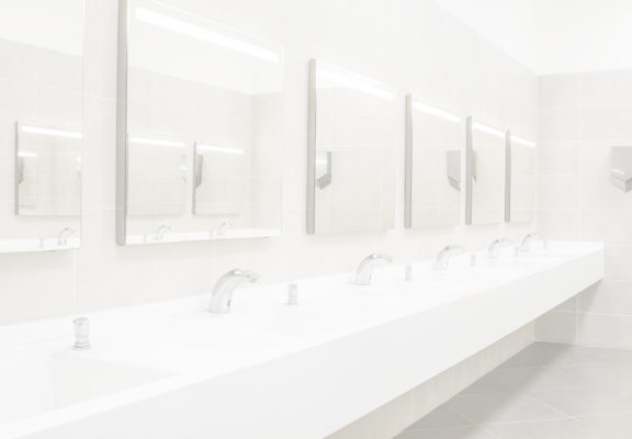 Row of sinks in commercial restroom